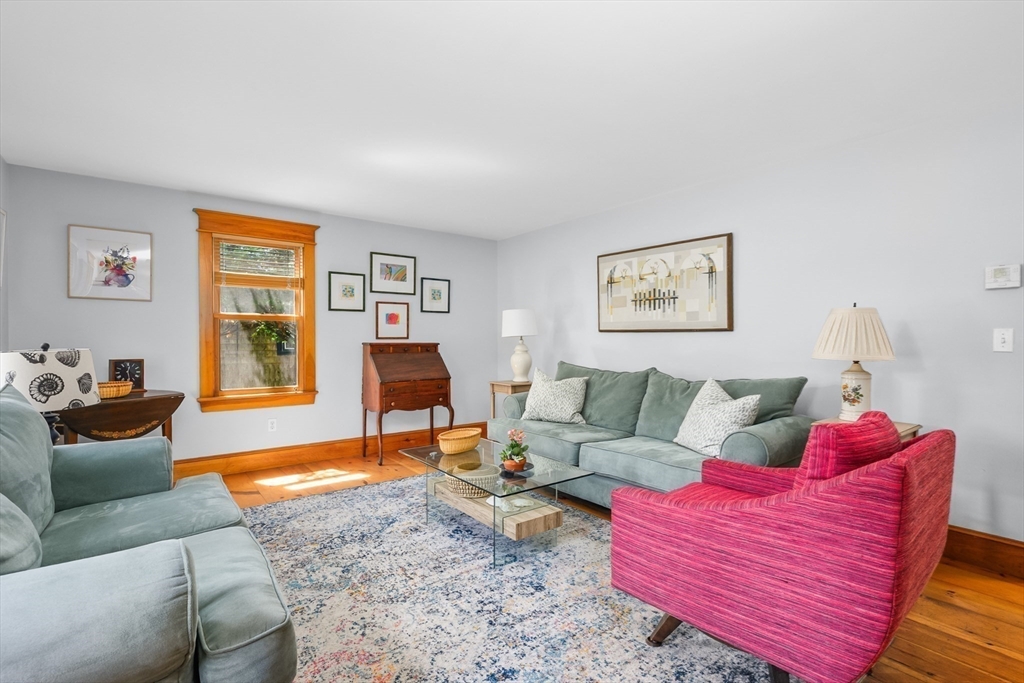 213 Hinckley Road Barnstable, MA 02601 - Photo 7 of 39 a living room with furniture and a window