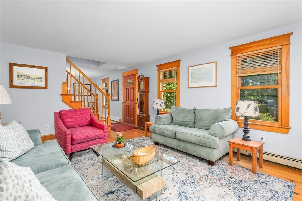 213 Hinckley Road Barnstable, MA 02601 - Photo 9 of 39 a living room with furniture and a window