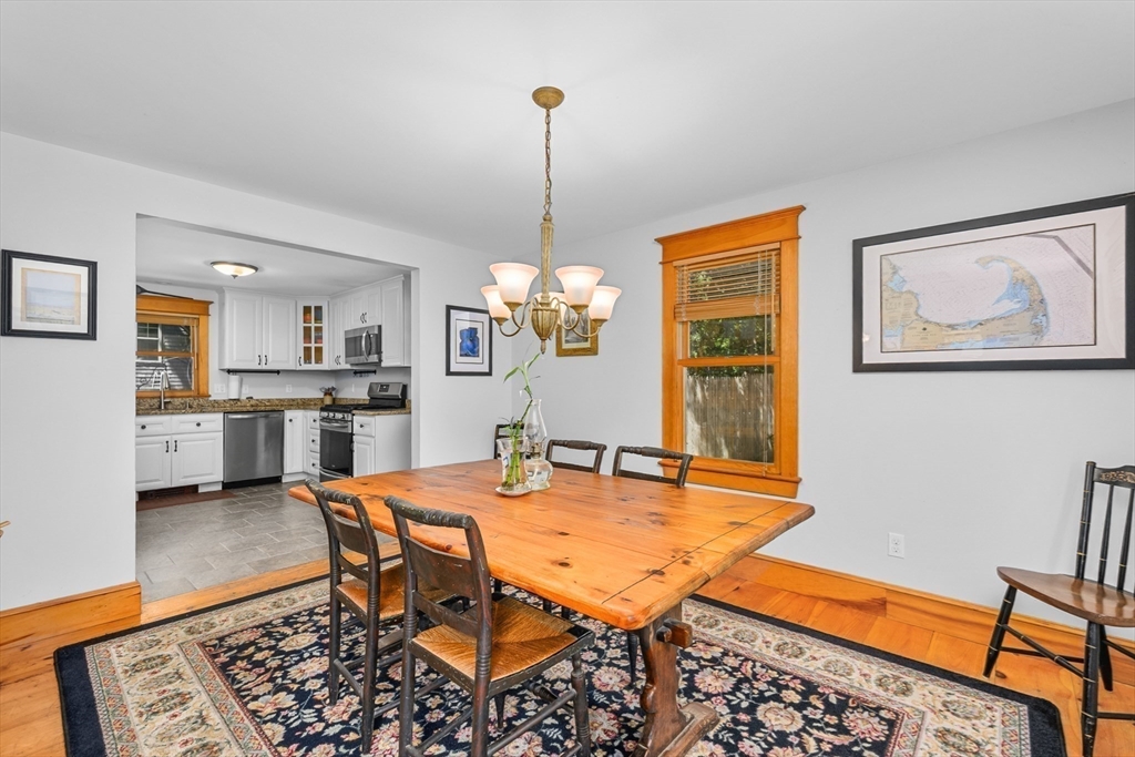 213 Hinckley Road Barnstable, MA 02601 - Photo 10 of 39 a dining room with furniture and window