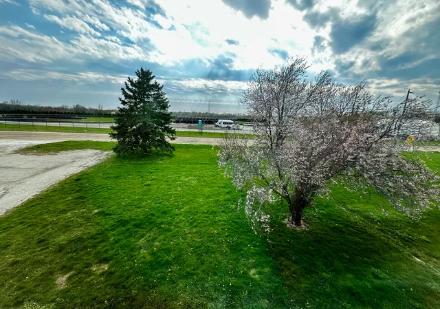 a view of a lake with a building in the background