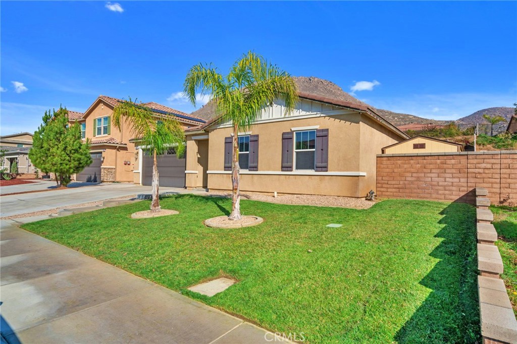 20972 Center Street Riverside, CA 92507 - Photo 1 of 1 a front view of house with yard