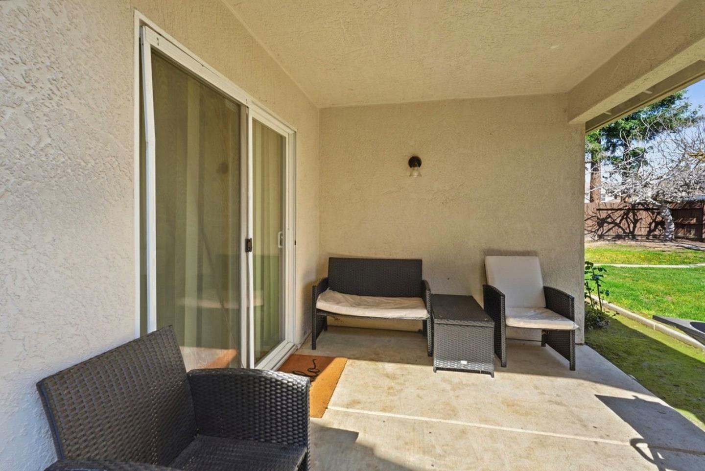 3882 Pintail Court Merced, CA 95340 - Photo 18 of 21 a living room with furniture and a window