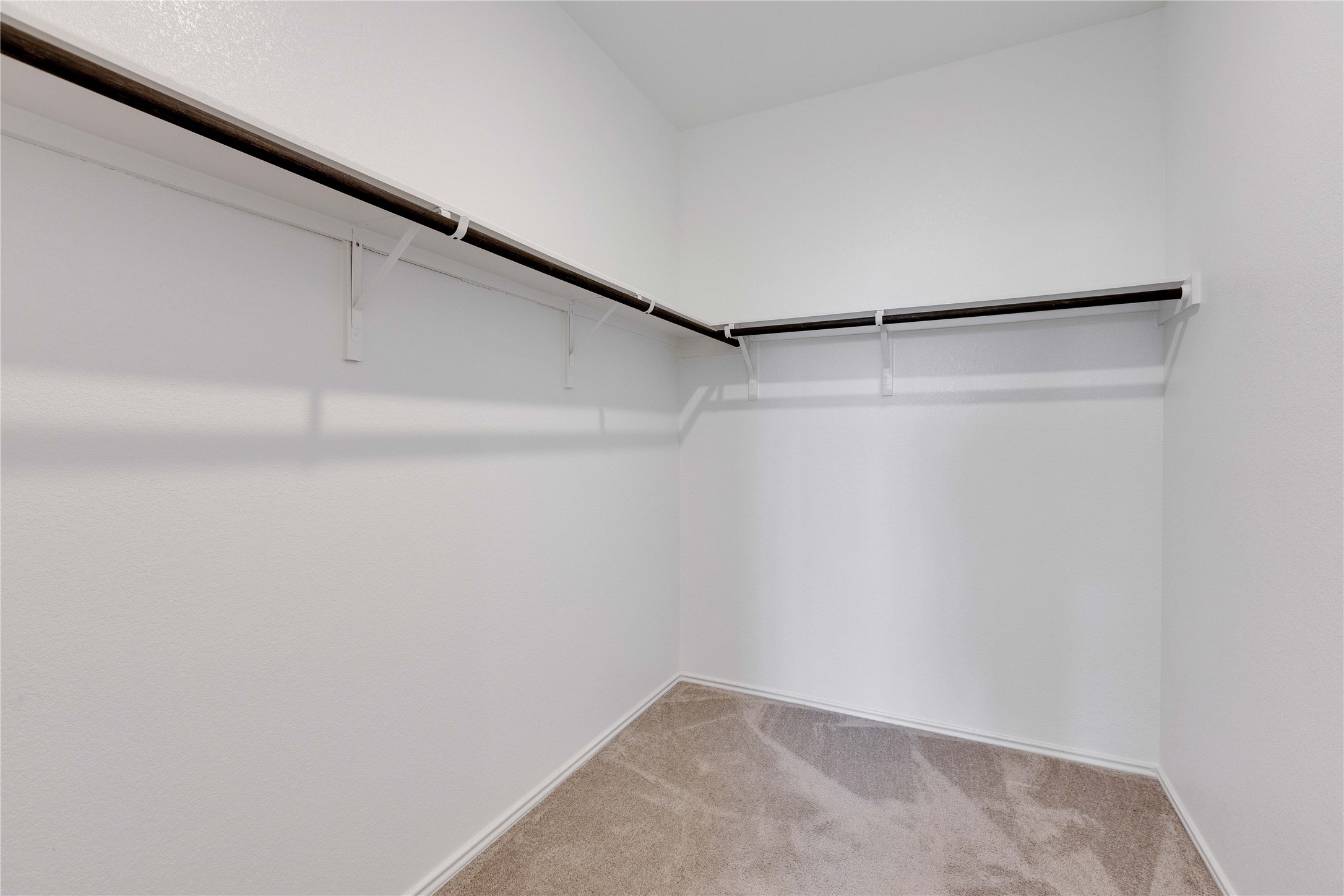 206 Canley Loop Hutto, TX 78634 - Photo 14 of 31 Spacious closet in primary bedroom.