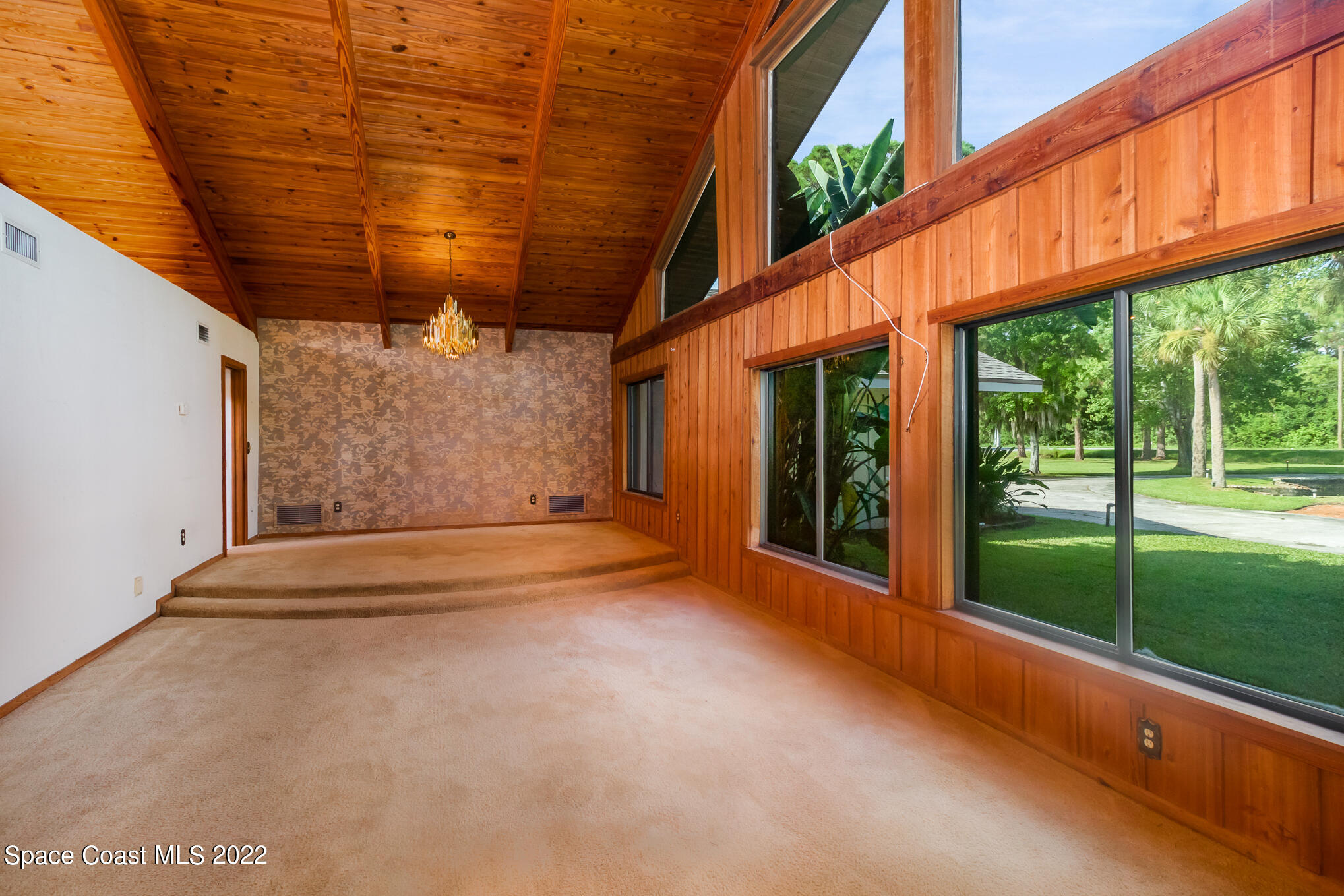 2187 Turtle Mound Road Melbourne, FL 32934 - Photo 12 of 42 a view of an outdoor space with a balcony