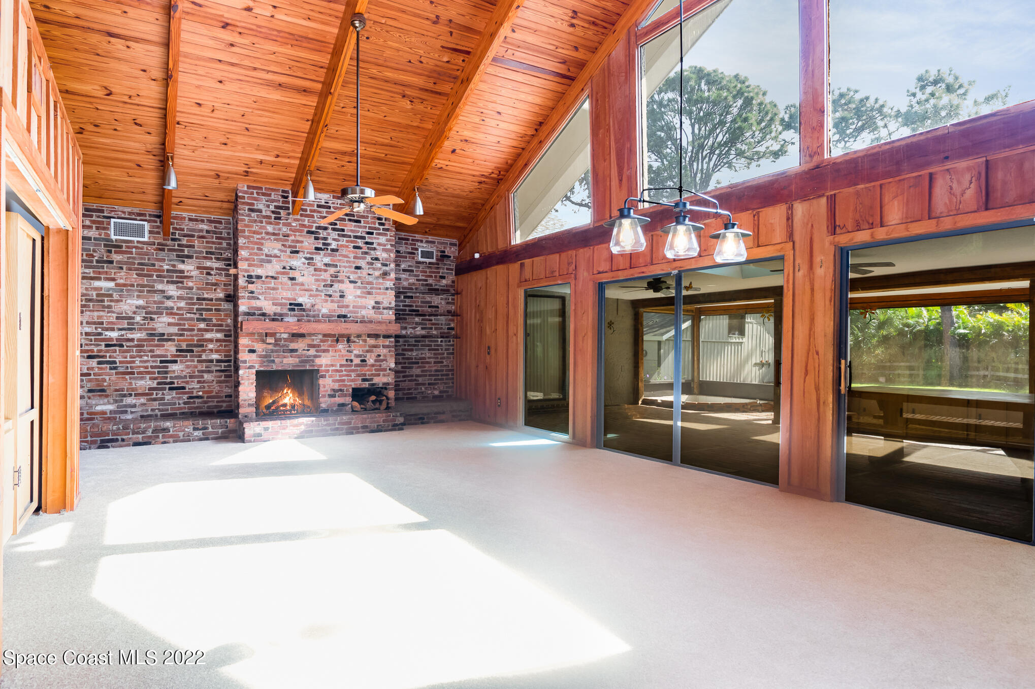 2187 Turtle Mound Road Melbourne, FL 32934 - Photo 14 of 42 a view of a building with a sink and wooden floor