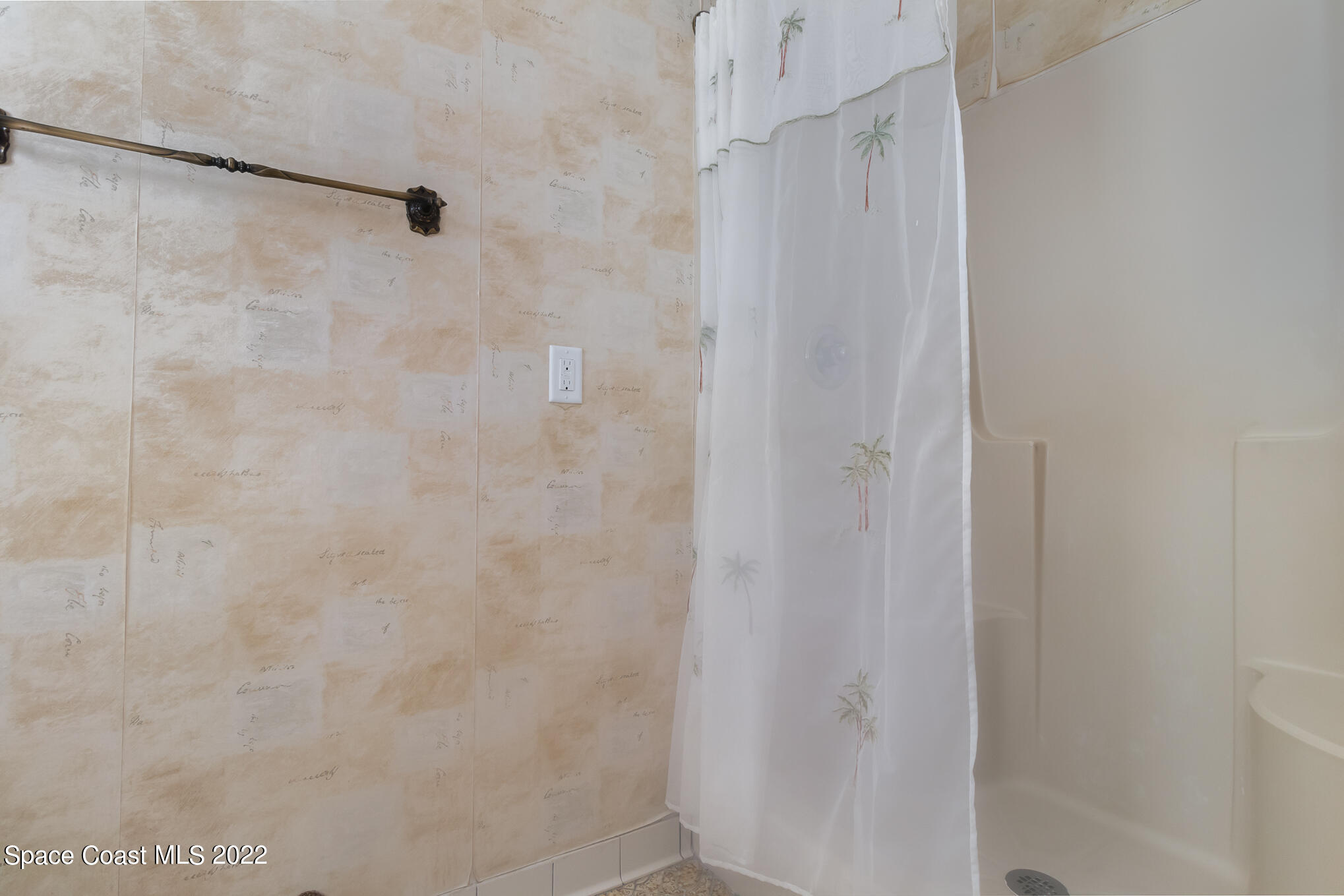 2187 Turtle Mound Road Melbourne, FL 32934 - Photo 26 of 42 a bathroom with a shower