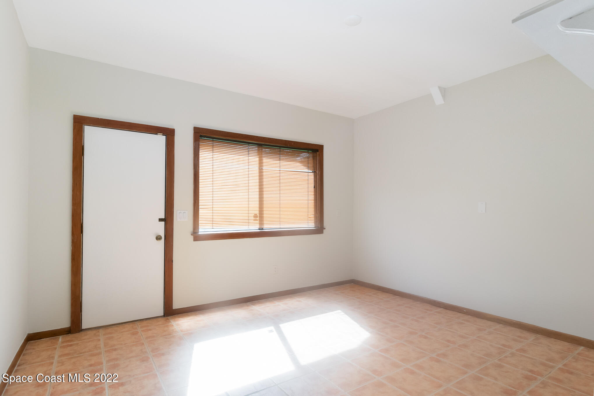 2187 Turtle Mound Road Melbourne, FL 32934 - Photo 30 of 42 an empty room with windows