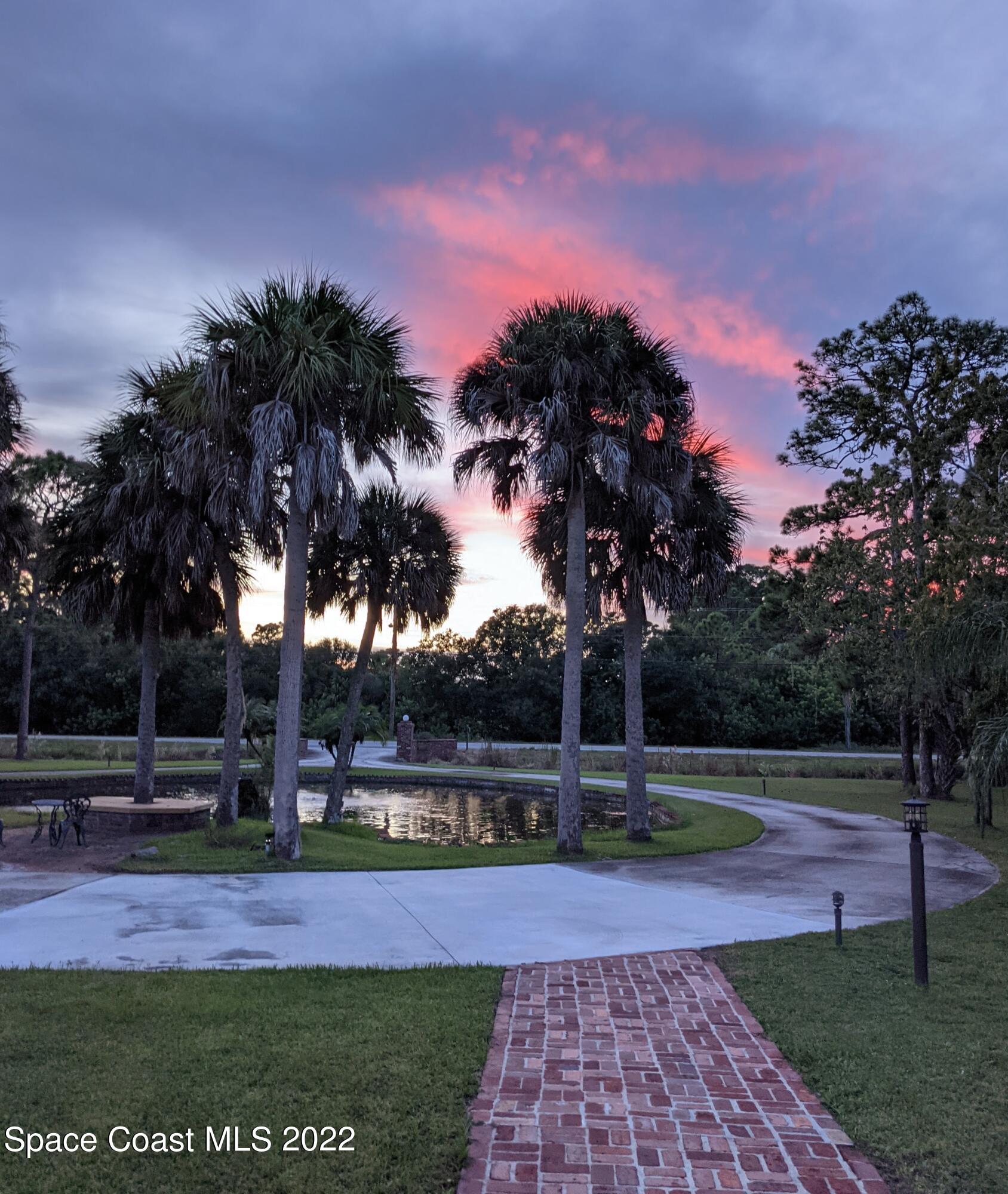 2187 Turtle Mound Road Melbourne, FL 32934 - Photo 39 of 42 a view of swimming pool with garden