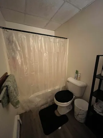 a bathroom with a toilet and a sink