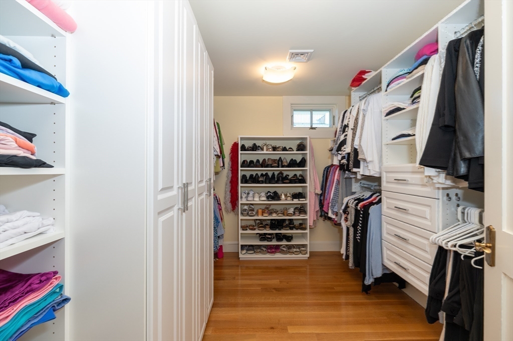 131 Atlantic Road Gloucester, MA 01930 - Photo 21 of 40 a view of walk in closet with clothes and shoes