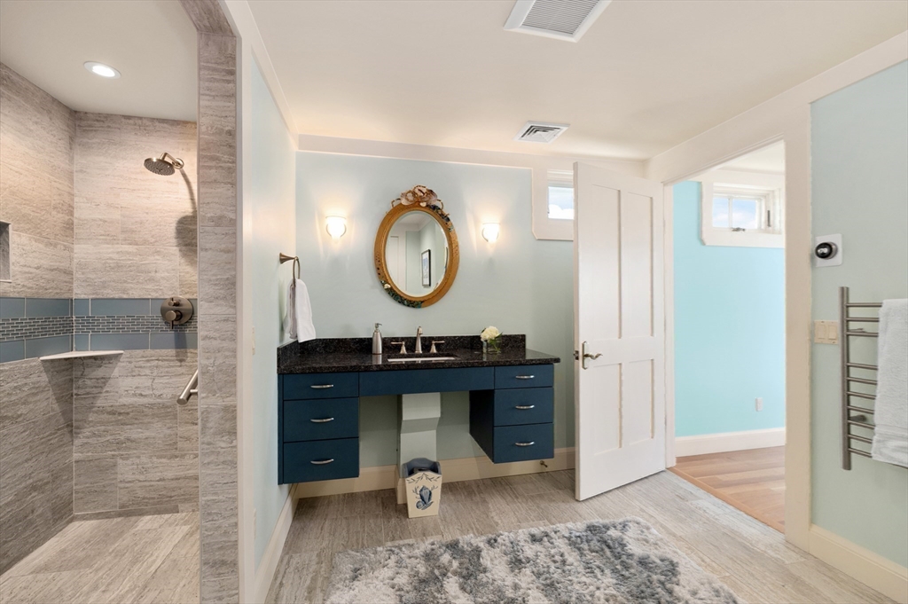 131 Atlantic Road Gloucester, MA 01930 - Photo 24 of 40 a view of a bathroom sink and a mirror