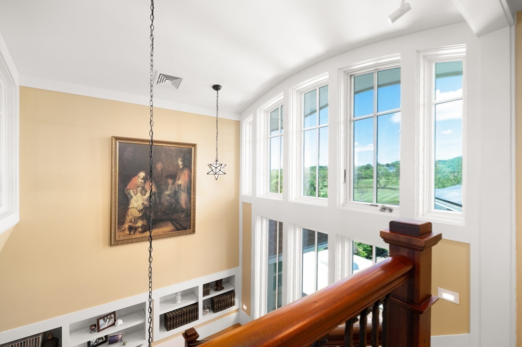 131 Atlantic Road Gloucester, MA 01930 - Photo 26 of 40 a view of a hallway with wooden floor and windows