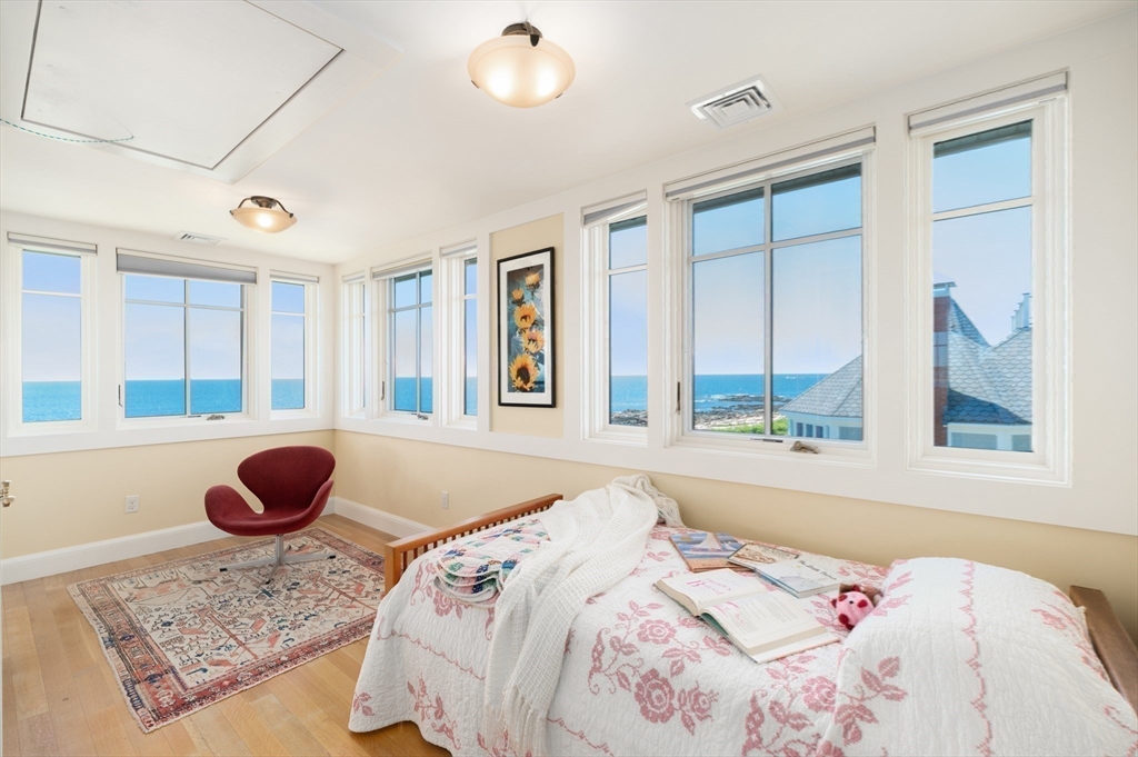 131 Atlantic Road Gloucester, MA 01930 - Photo 29 of 40 a bedroom with a bed and window