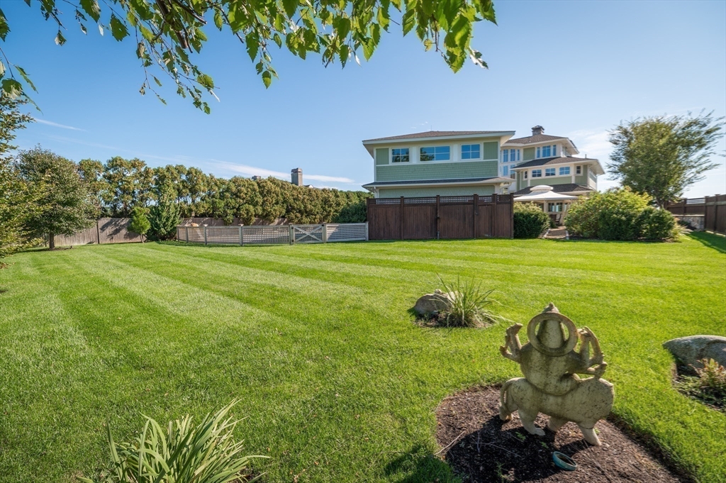 131 Atlantic Road Gloucester, MA 01930 - Photo 40 of 40 a view of a chair and table in the garden