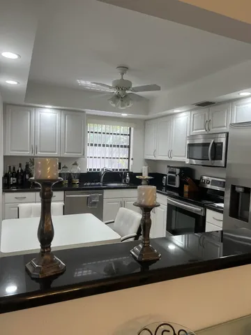 a kitchen with a appliances