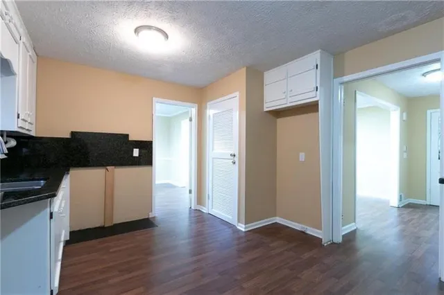 wooden floor and cabinets in a room