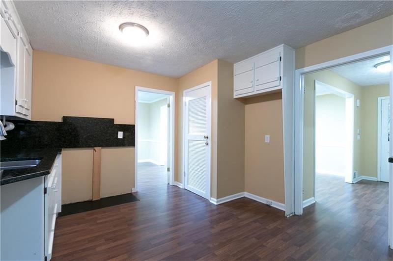 2251 Roswell Road Northeast Marietta, GA 30062 - Photo 12 of 12 wooden floor and cabinets in a room
