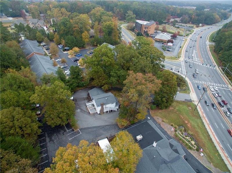 2251 Roswell Road Northeast Marietta, GA 30062 - Photo 2 of 12 an aerial view of a house with a yard