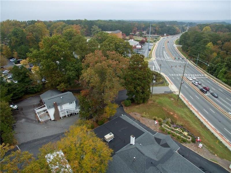 2251 Roswell Road Northeast Marietta, GA 30062 - Photo 5 of 12 an aerial view of a house with a yard