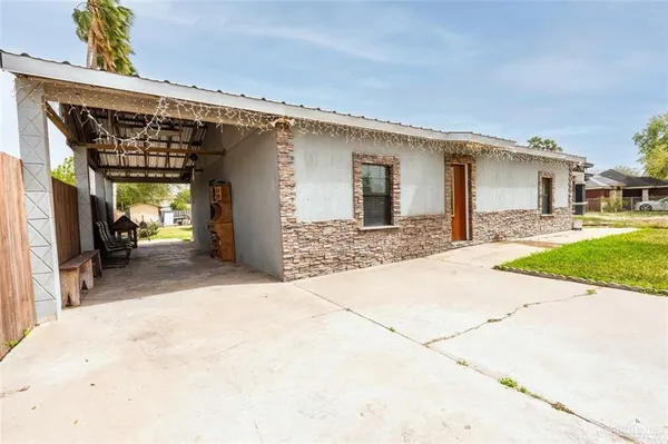 a view of a house with a patio