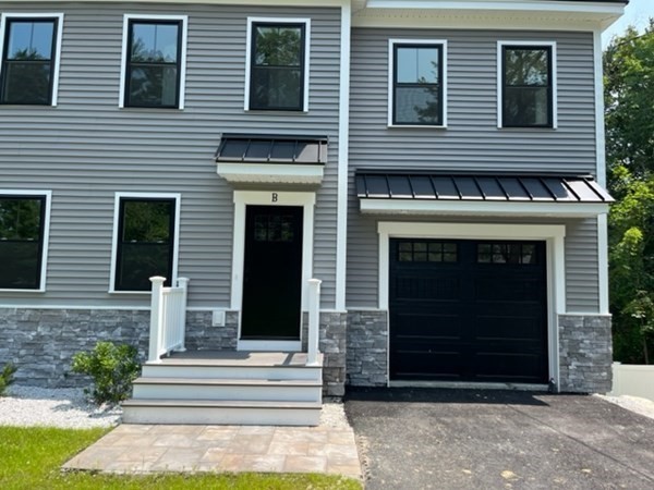 19 Indian Road, Unit B Groton, MA 01450 - Photo 1 of 27 a front view of a house