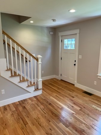 19 Indian Road, Unit B Groton, MA 01450 - Photo 16 of 27 a view of entryway with wooden floor