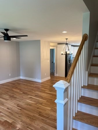 19 Indian Road, Unit B Groton, MA 01450 - Photo 17 of 27 a view of entryway and hall with wooden floor