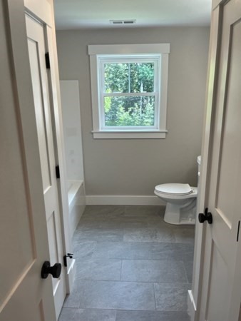 19 Indian Road, Unit B Groton, MA 01450 - Photo 23 of 27 a bathroom with a toilet and a shower