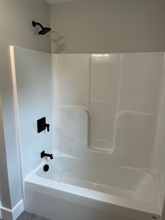 19 Indian Road, Unit B Groton, MA 01450 - Photo 24 of 27 a bathroom with a bathtub
