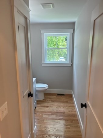 19 Indian Road, Unit B Groton, MA 01450 - Photo 10 of 27 a bathroom with a toilet and a window