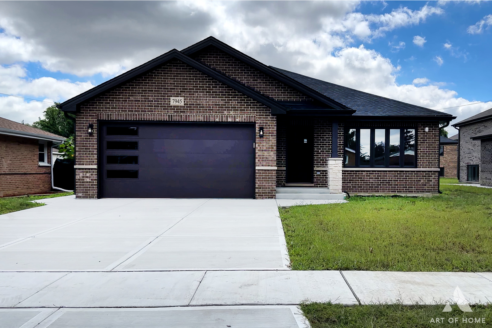 a front view of a house with a yard