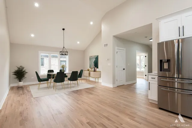 a living room with furniture or kitchen and a wooden floor