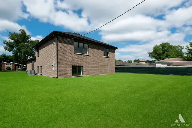 a house view with garden space