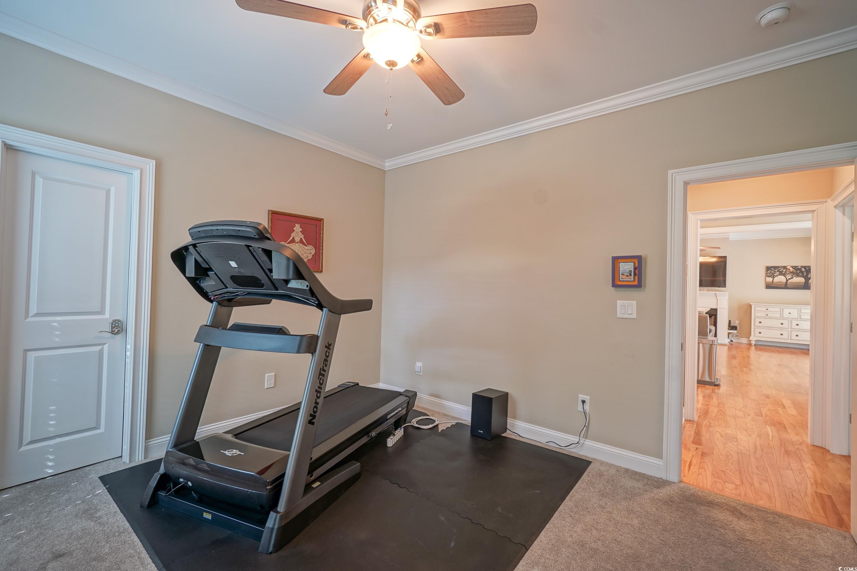 625 Whispering Pines Court Murrells Inlet, SC 29576 - Photo 20 of 36 2nd Bedroom with baseboards, ornamental molding, carpet flooring, and ceiling fan