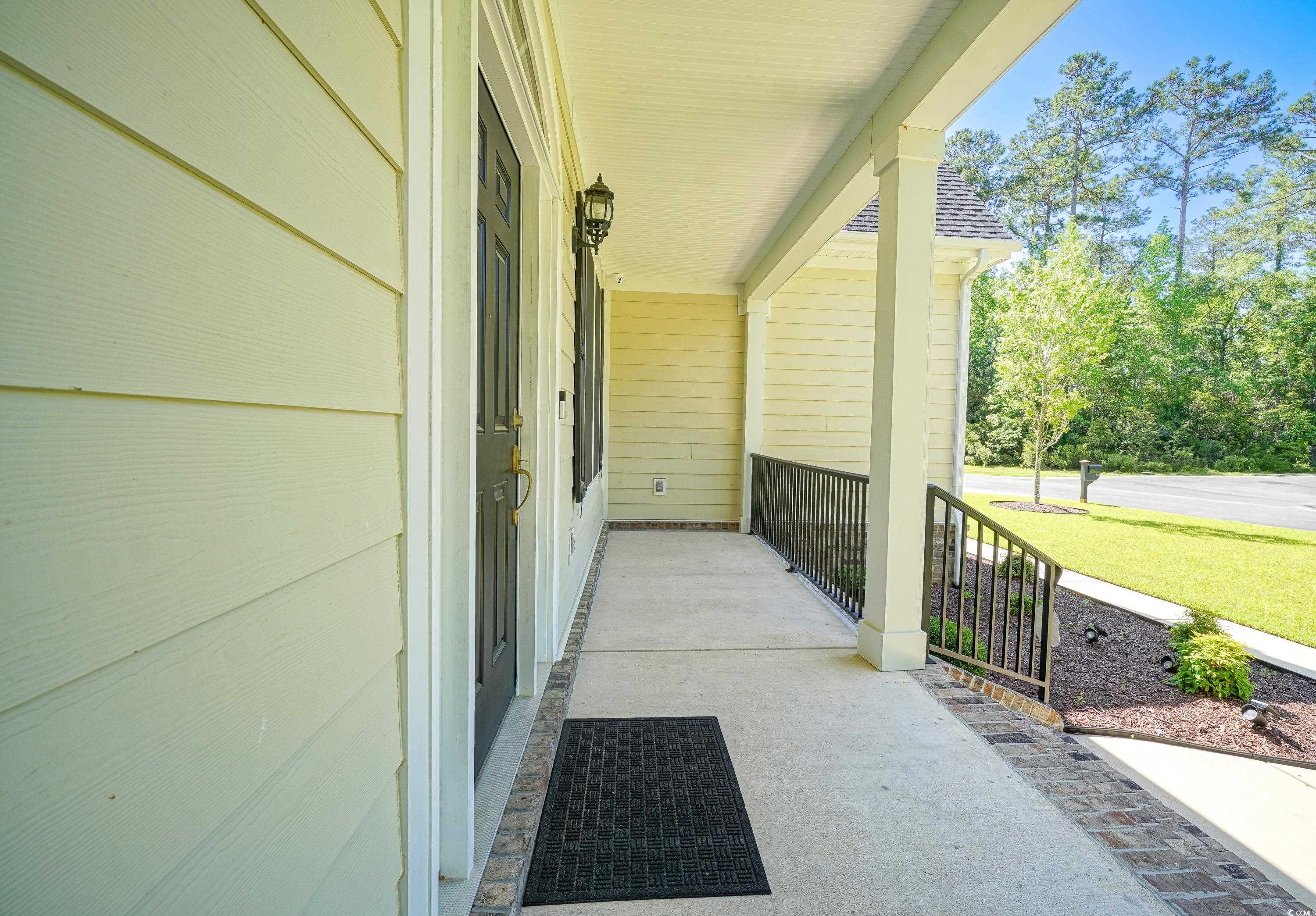 625 Whispering Pines Court Murrells Inlet, SC 29576 - Photo 3 of 36 View of patio / terrace featuring a porch