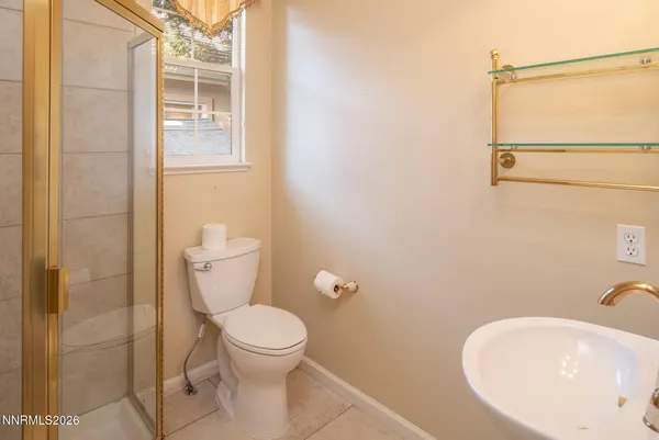 a bathroom with a toilet and a sink