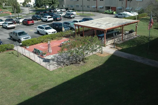a view of an outdoor dining space with furniture