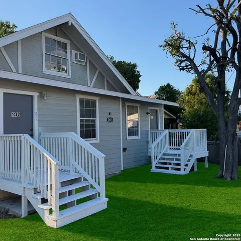 a view of a deck with a table and a chair