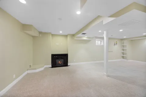 an empty room with a flat screen tv