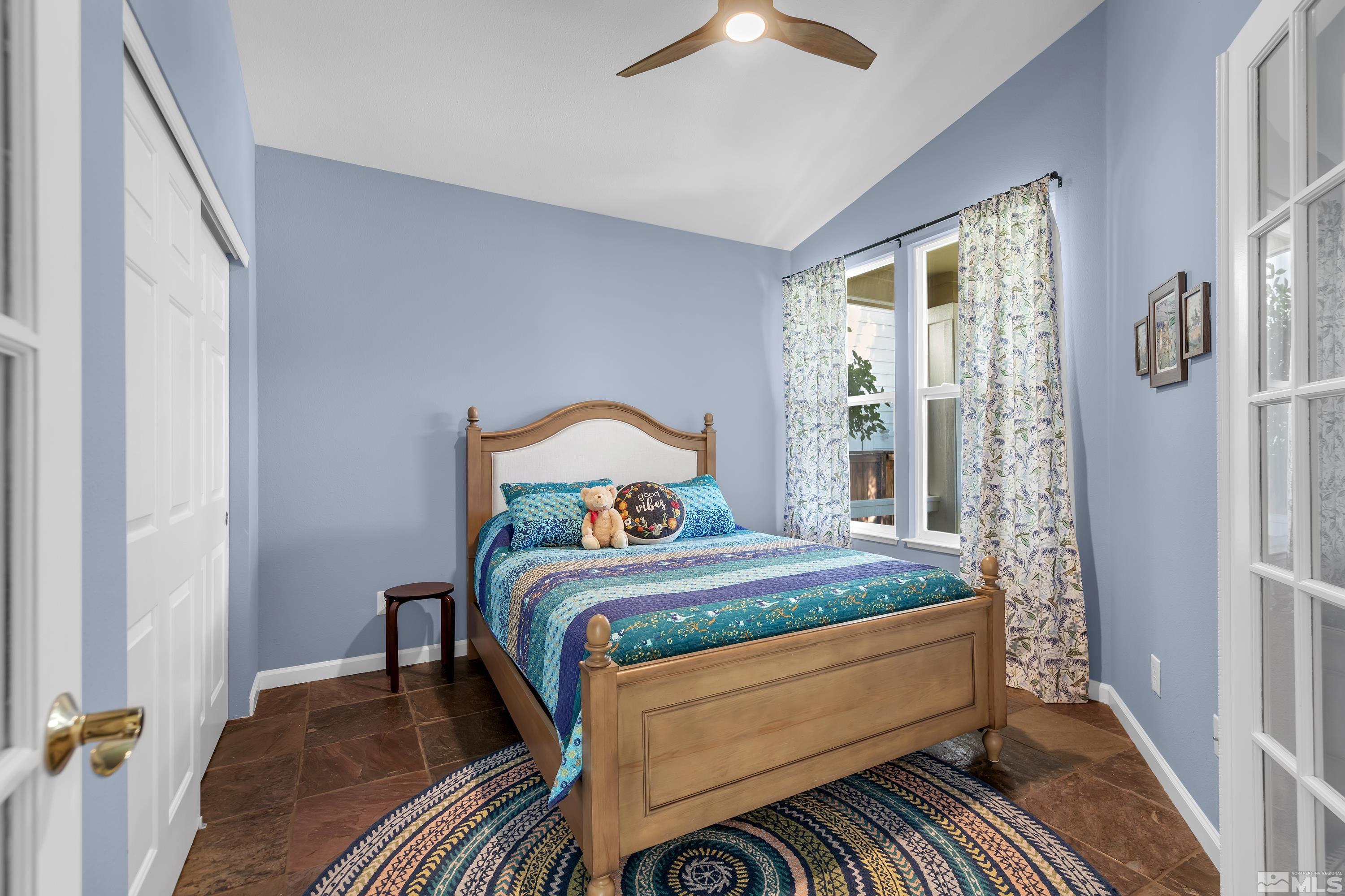 809 Caughlin Glen Reno, NV 89519 - Photo 13 of 23 a bedroom with a bed and wooden floor