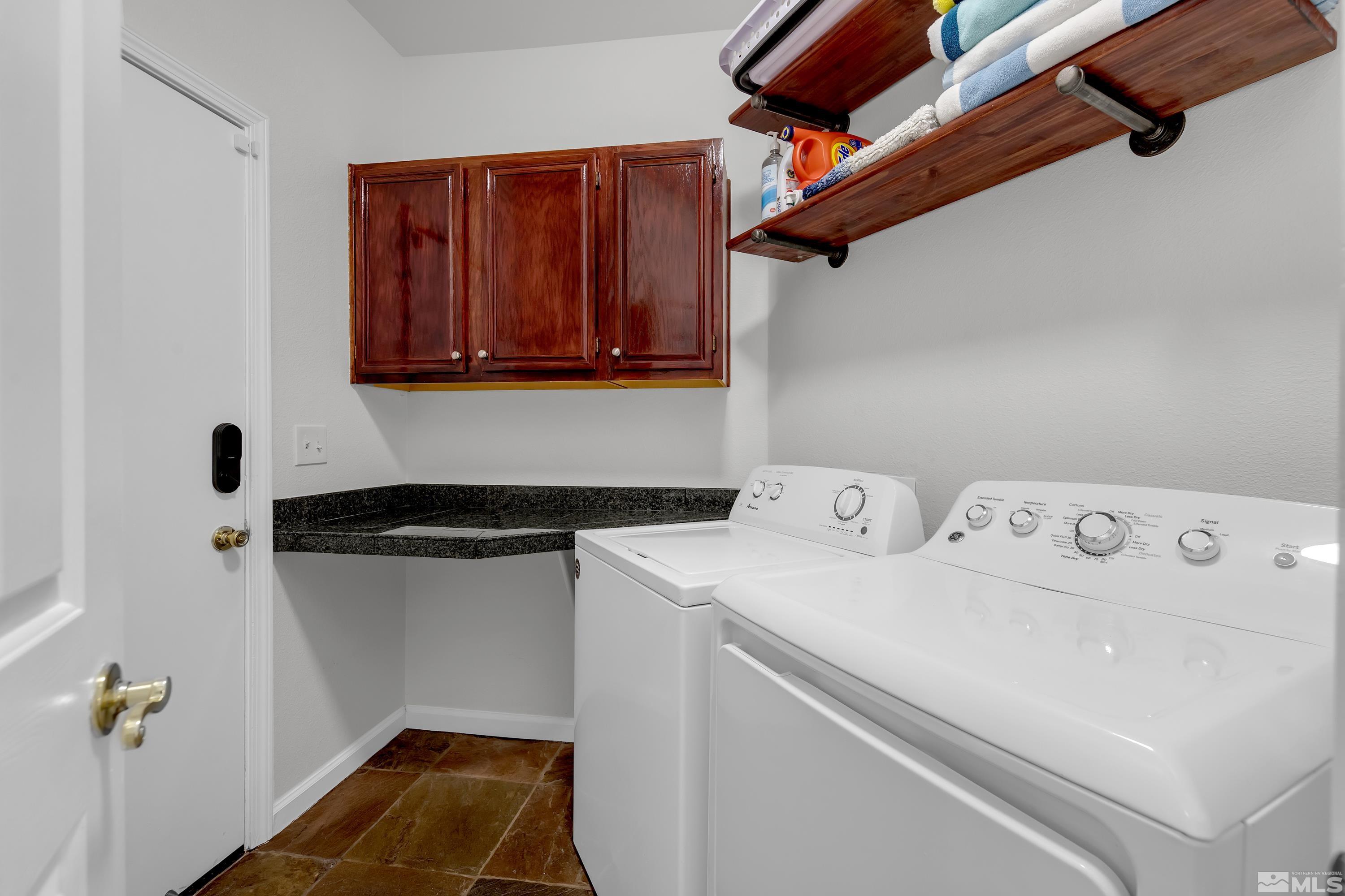 809 Caughlin Glen Reno, NV 89519 - Photo 15 of 23 a utility room with dryer and washer