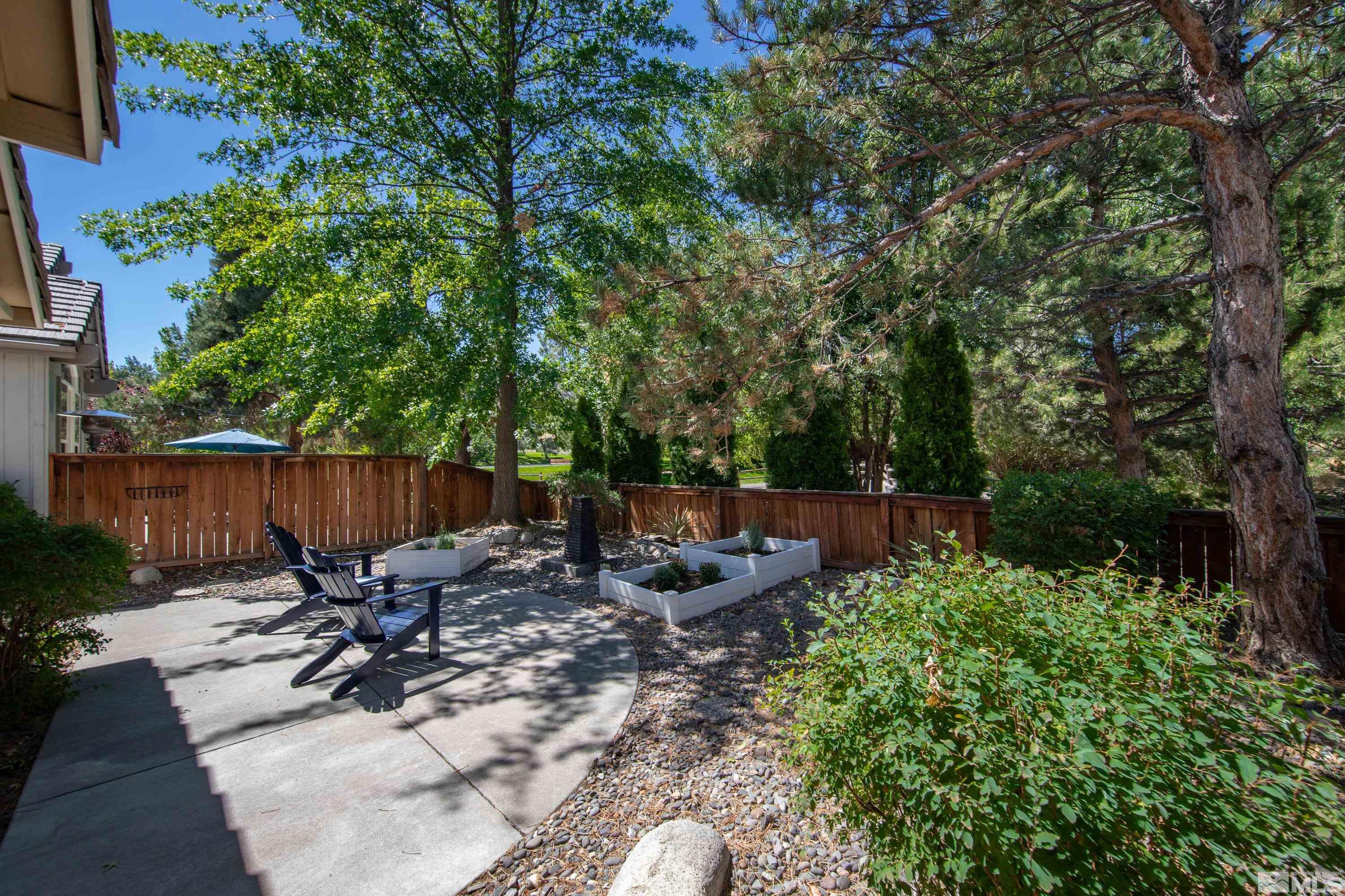 809 Caughlin Glen Reno, NV 89519 - Photo 17 of 23 a view of a backyard with sitting area and furniture