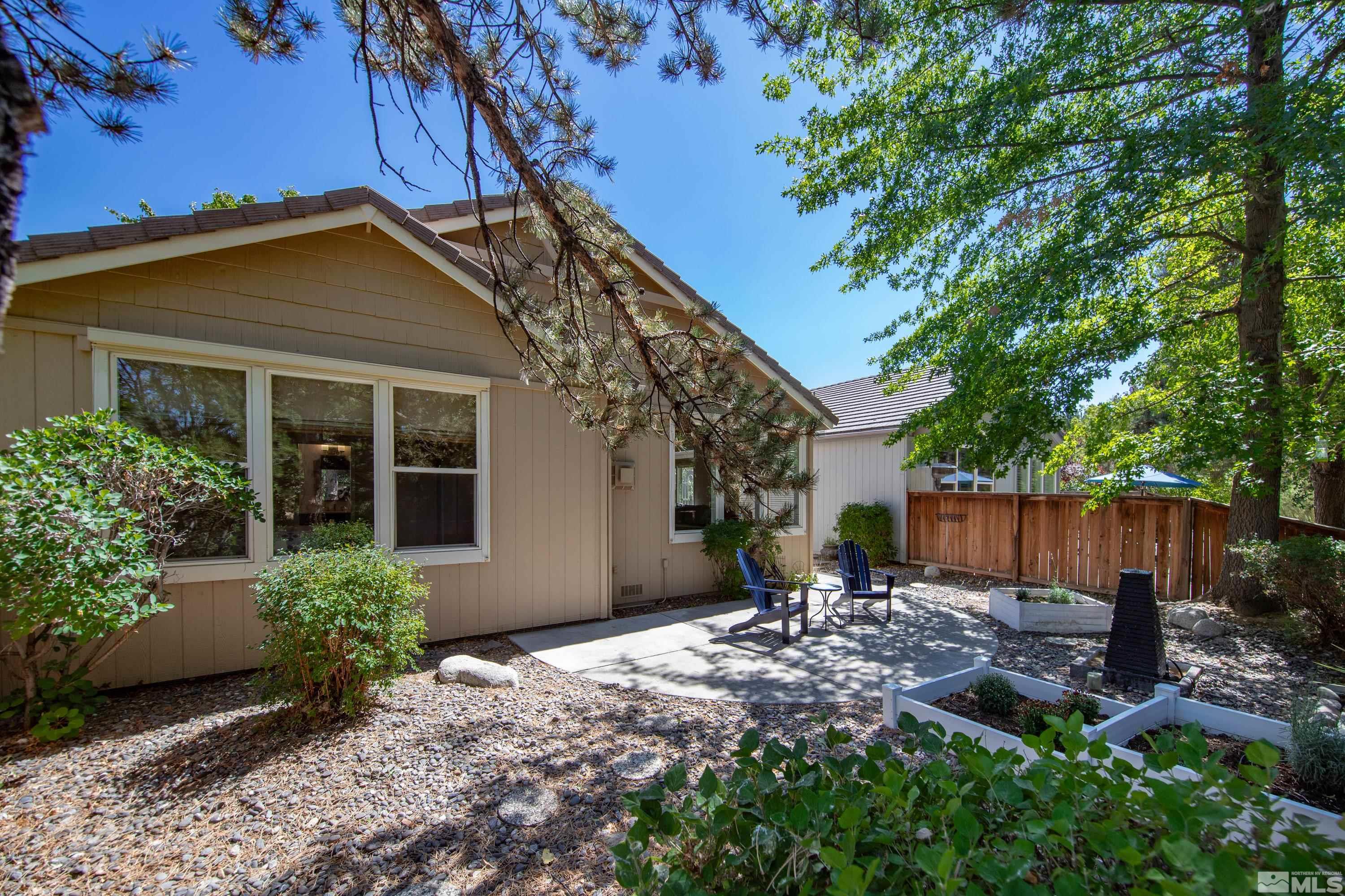 809 Caughlin Glen Reno, NV 89519 - Photo 19 of 23 a front view of a house with garden