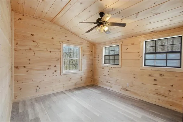 a view of empty room with windows