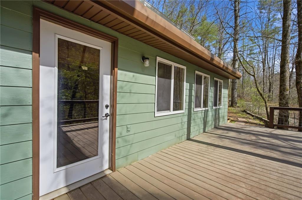 1780 Conasauga Road Ellijay, GA 30540 - Photo 20 of 43 a view of a house with a large window