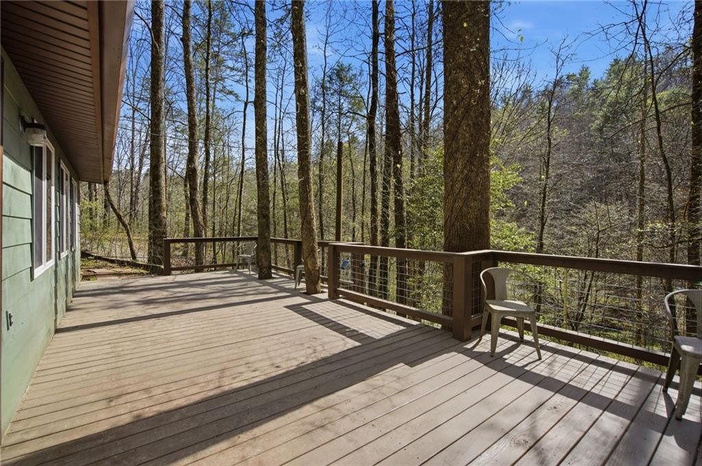 1780 Conasauga Road Ellijay, GA 30540 - Photo 22 of 43 a view of balcony with wooden floor and fence