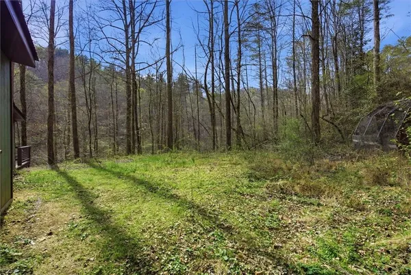 a picture of a bathroom with a shower