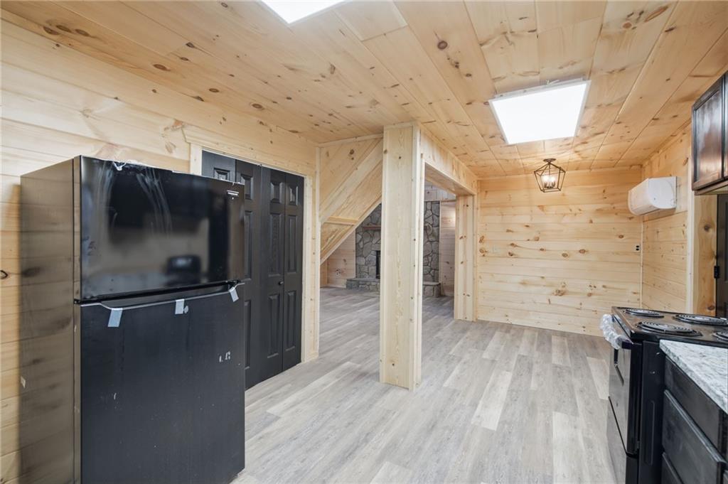 1780 Conasauga Road Ellijay, GA 30540 - Photo 9 of 43 a view of empty room with wooden floor