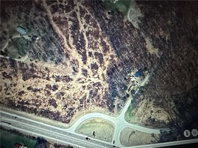 a view of sitting area in a backyard