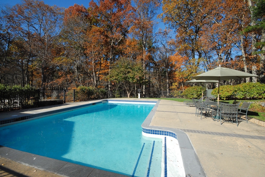 968 Lowell Road Concord, MA 01742 - Photo 4 of 39 a view of swimming pool with chairs
